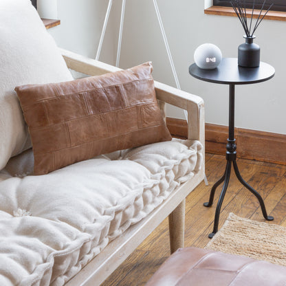 tobacco color stitched leather cushion, Black evans cocktail table
